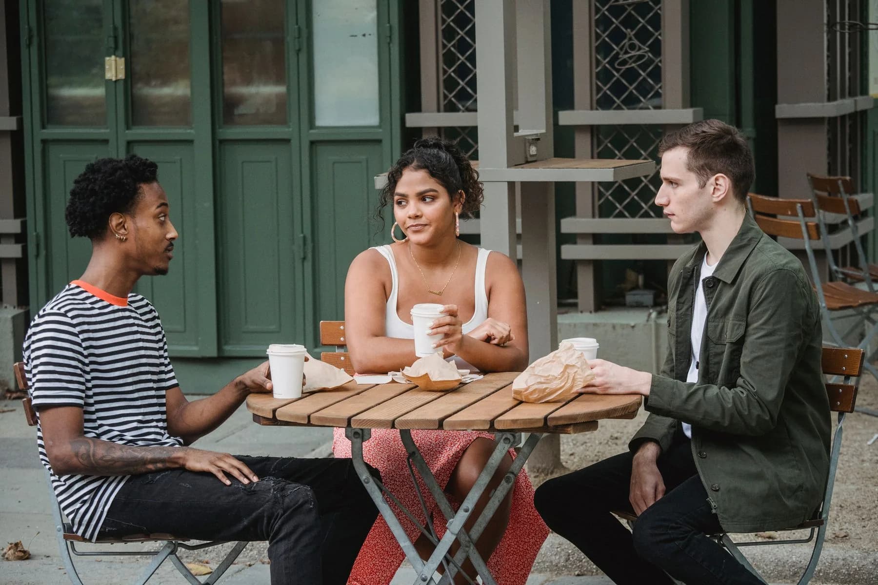 Friends enjoying conversation and coffee
